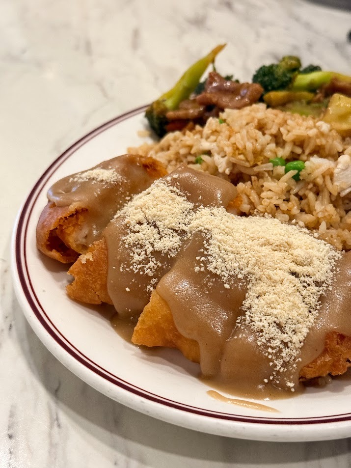 Almond chicken with fried rice and vegetables
