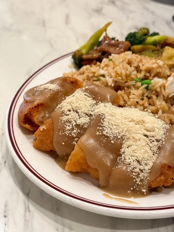 Almond chicken with fried rice and vegetables