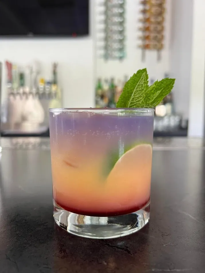 Coastal Haze cocktail with mint garnish