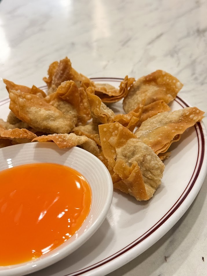 Crispy deep fried wontons with sweet and sour sauce